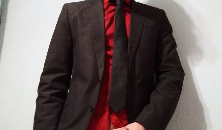 Faggot Sebastian in suit and tie